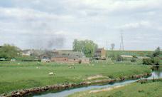 View of St Thomas Priory with St Thomas Mill in front.