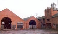 Demolished Cow Barns behind main entrance arch at Tixall Farm